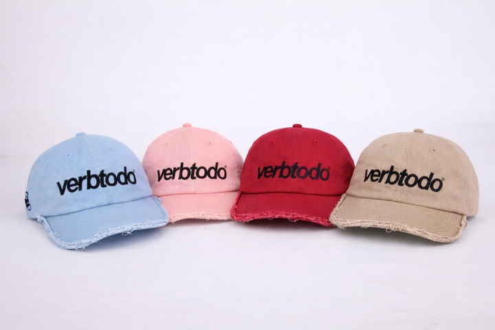 Ripped light blue cap Verb to do