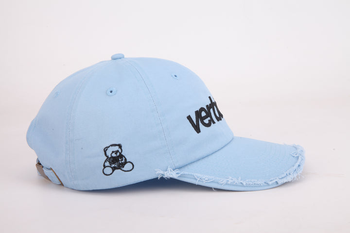 Ripped light blue cap Verb to do