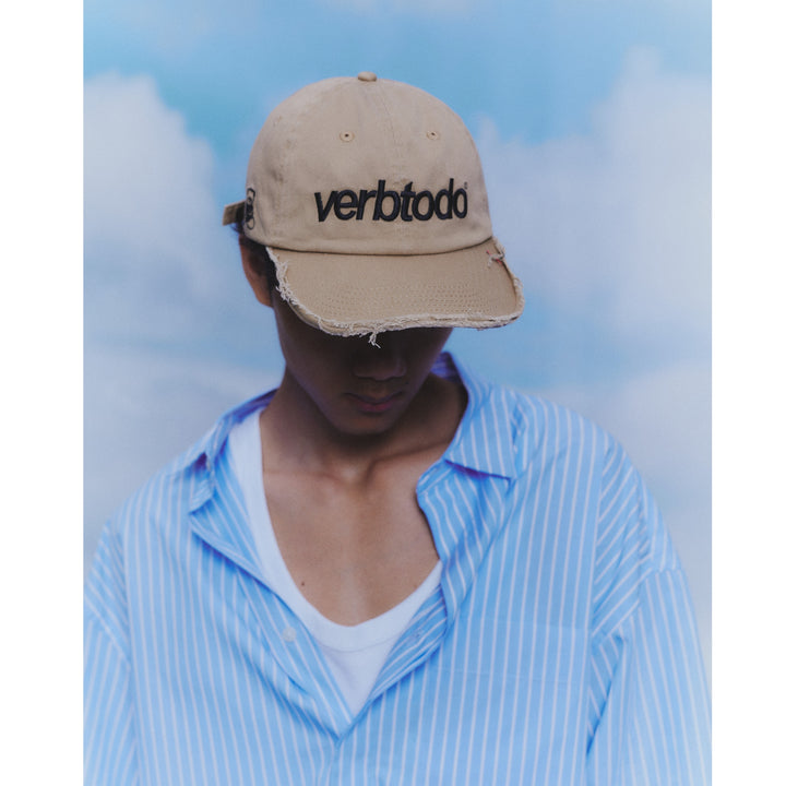 Ripped Beige Cap Verb to Do